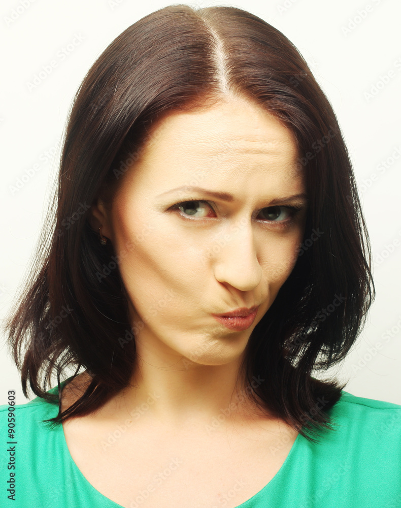 Thinking woman. Studio shot. Thinking woman. Studio shot.