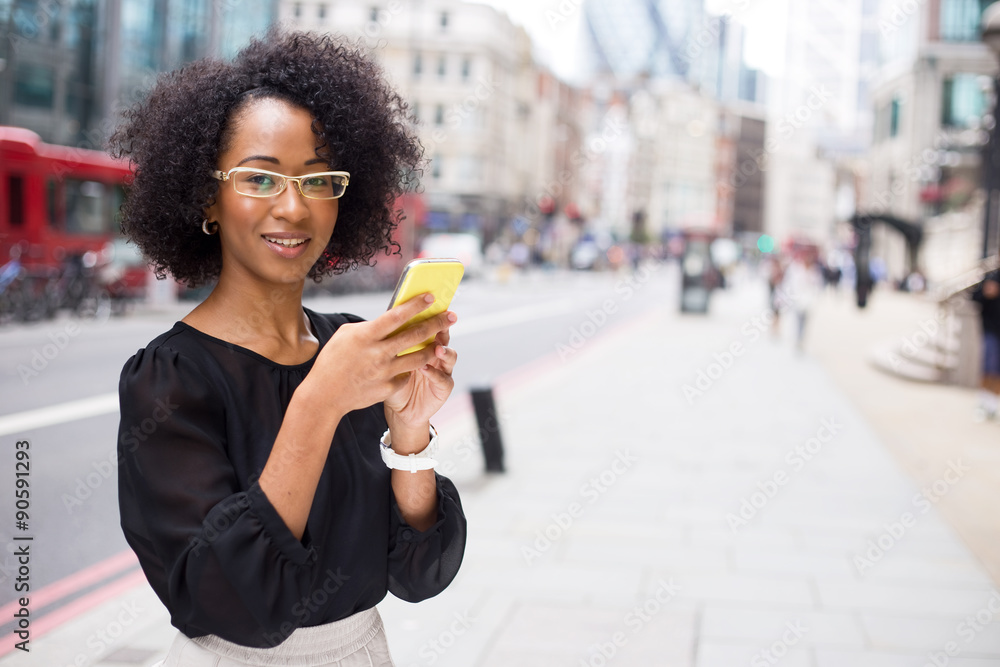 young woman using her mobile phone young woman using her mobile phone