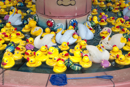 Toy ducklings and swans in a skill game at the Fair, US, 2015. photo