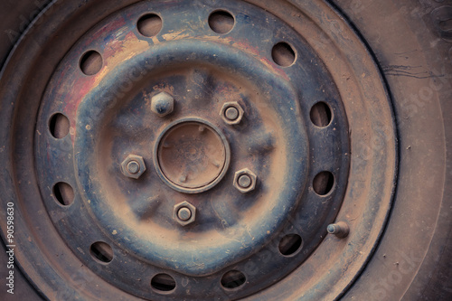scrap wheel of car abandoned, close up image