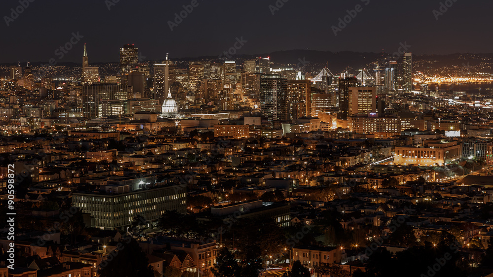 San Francisco skyline and bay bridge at night