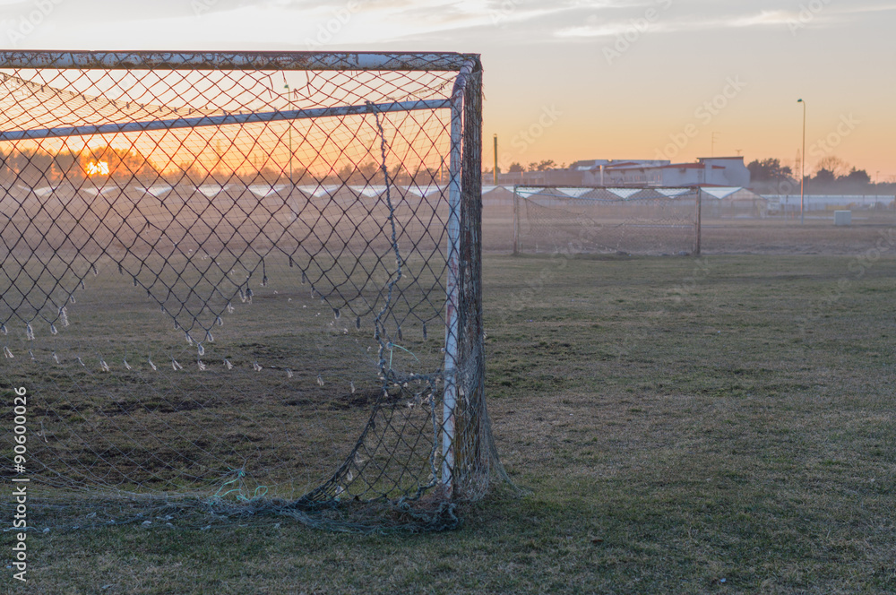 Abandoned soccer field and old rusty goals on sunset, nostalgia concept Stock Photo Adobe Stock