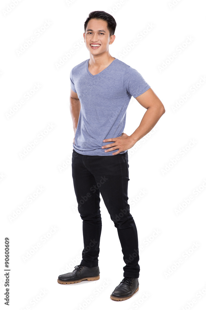 happy Young asian man posing hands on the waist, smile to the ca happy Young asian man posing hands on the waist, smile to the ca