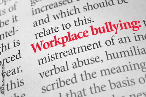 Fotografie Definition of the term Workplace bullying in a dictionary