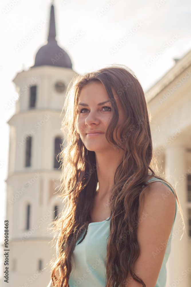 Fototapeta premium beautiful girl on the background of city