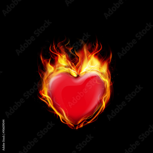 Fire burning a heart on black background