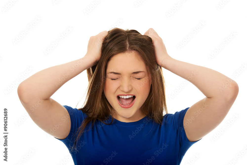 Frustrated young woman screaming. Frustrated young woman screaming.