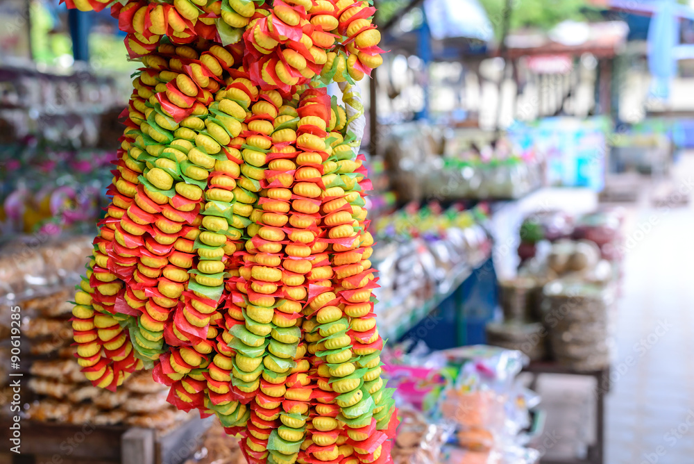 Kanom Puang Ma Lai, Thai cookie bunch with string as souvenir.