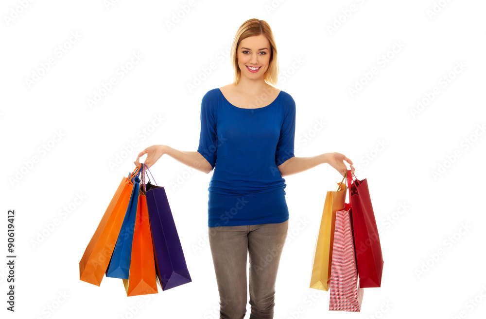 Woman with a lot of shopping bags. Woman with a lot of shopping bags.