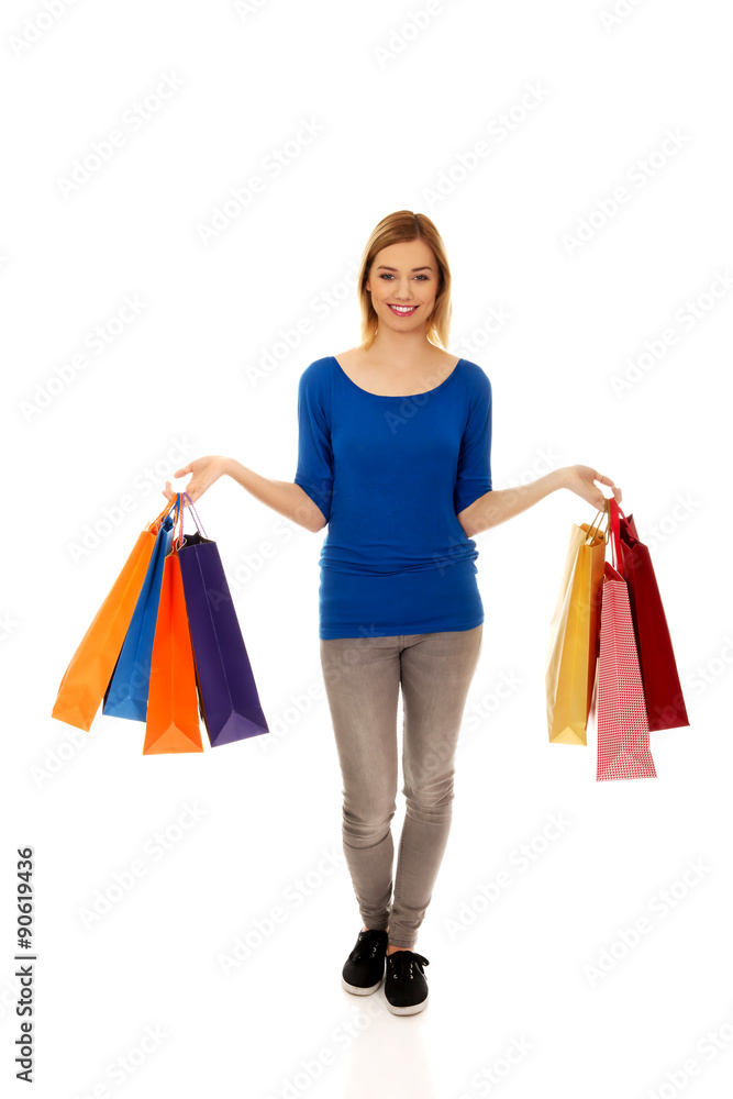 Woman with a lot of shopping bags. Woman with a lot of shopping bags.