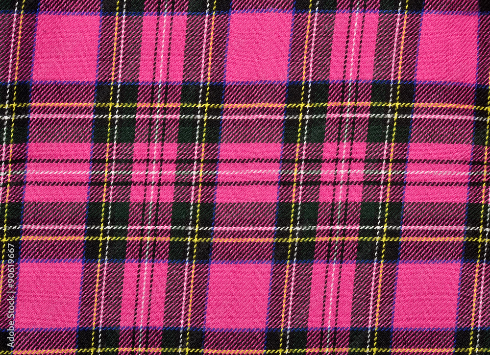Scottish tartan pattern. Magenta pink and black plaid print as background. Symmetric square pattern. Scottish tartan pattern. Magenta pink and black plaid print as background. Symmetric square pattern.