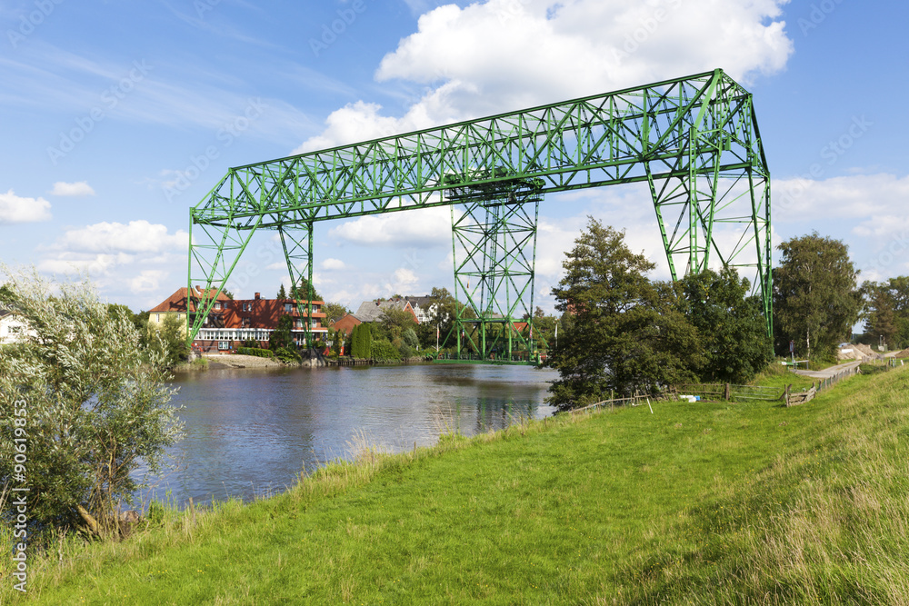 Obraz premium Osten transporter bridge. Historic transporter bridge at Osten, Lower Saxony, Germany