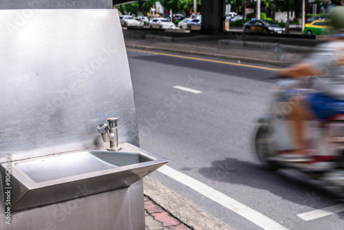 Water fountain in city for drinking. © Eakkaluk
