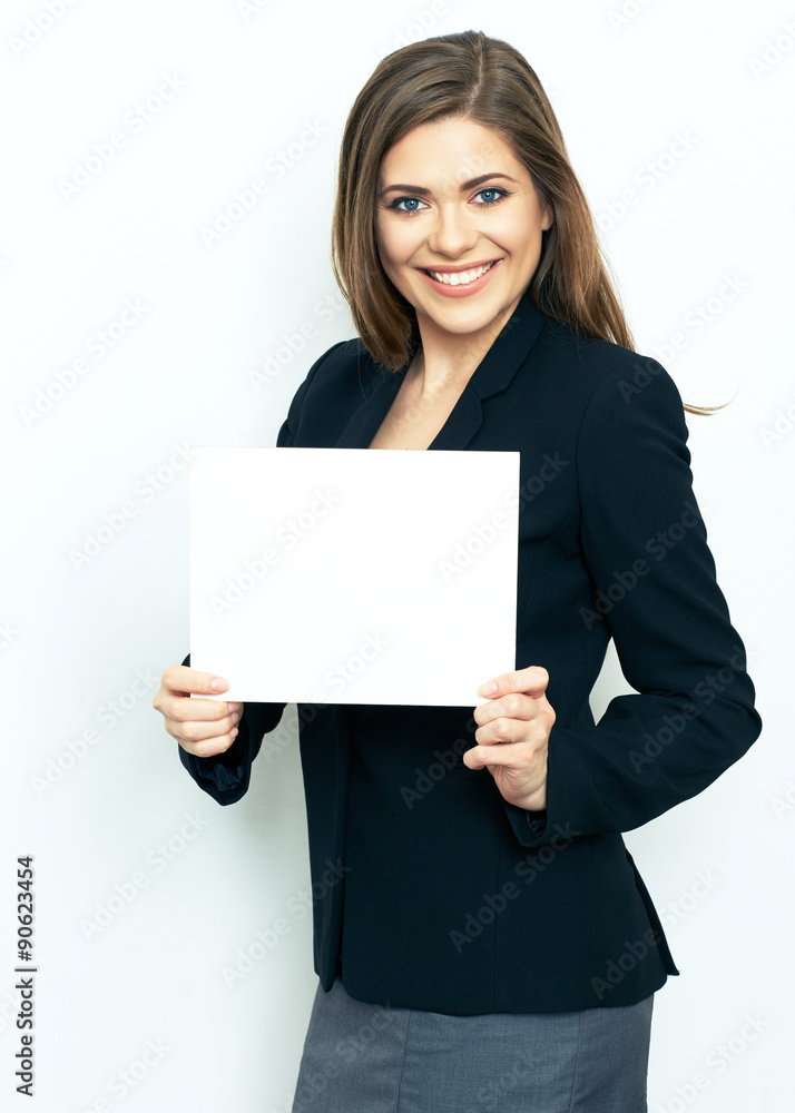 Smiling female office worker holding white sign board. Smiling female office worker holding white sign board.