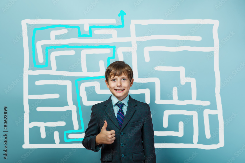 a boy of twelve European appearance in a suit holding a blank sh a boy of twelve European appearance in a suit holding a blank sh