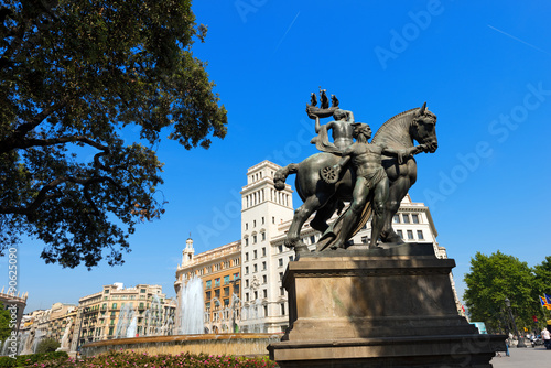 Placa de Catalunya - Barcelona Spain / Allegorical monument of Barcelona in Catalunya square, large square in central Barcelona that is generally considered to city center photo