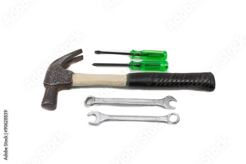 Hammer,wrench and screwdriver on white background