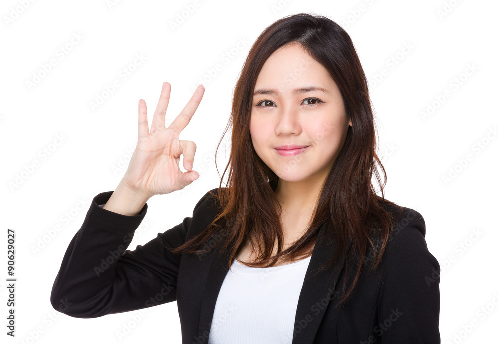 Businesswoman with ok sign gesture Businesswoman with ok sign gesture
