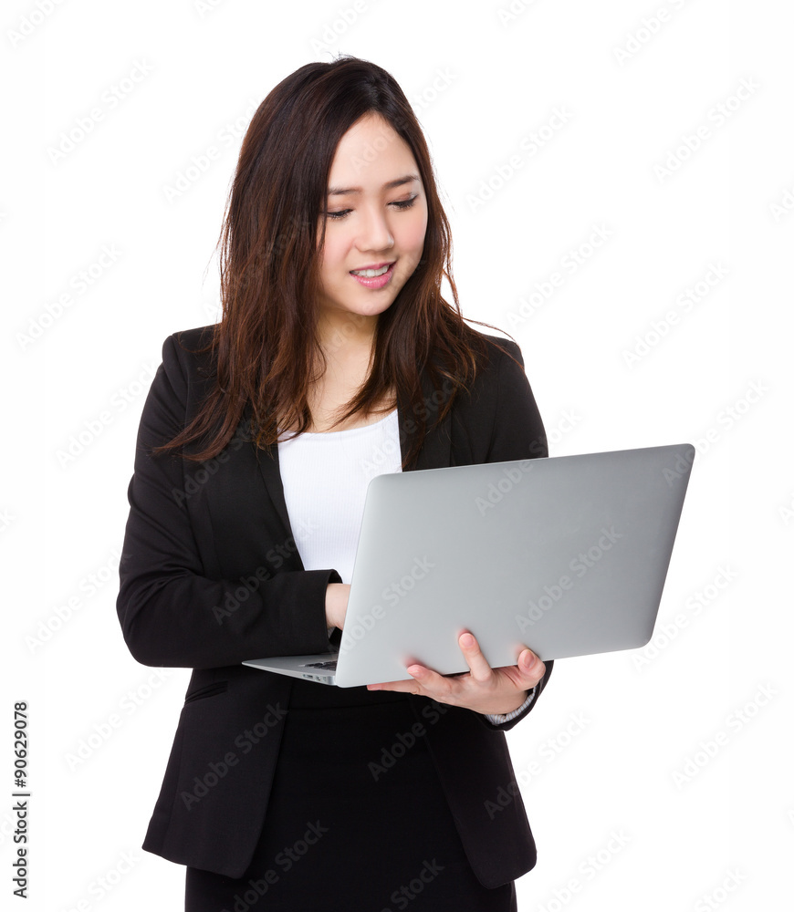 Young businesswoman use of the notebook computer Young businesswoman use of the notebook computer