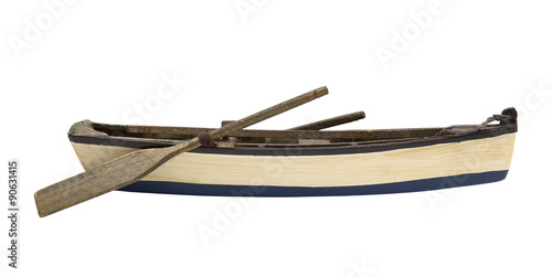 Картината върху платно Isolated wooden boat with paddles