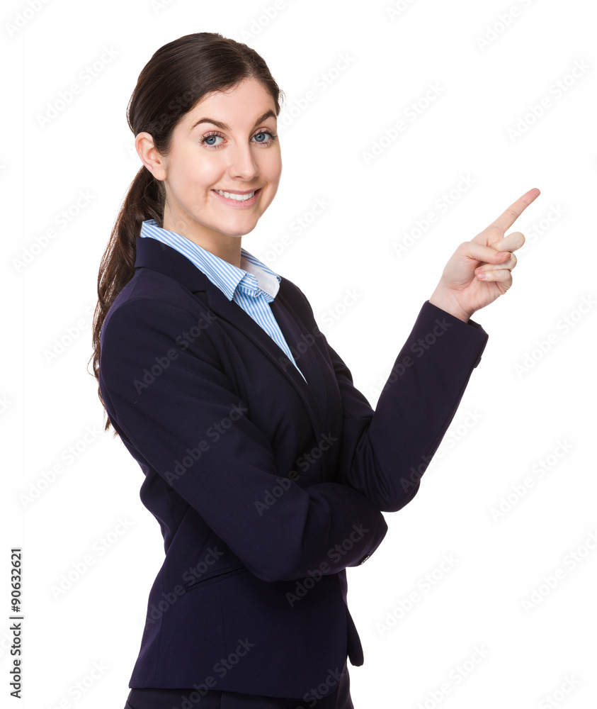 Brunette young businesswoman with finger point up Brunette young businesswoman with finger point up