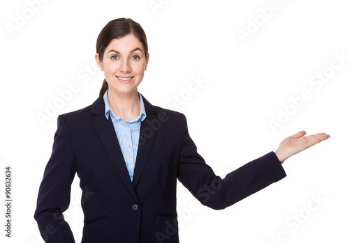 Businesswoman with hand showing blank sign