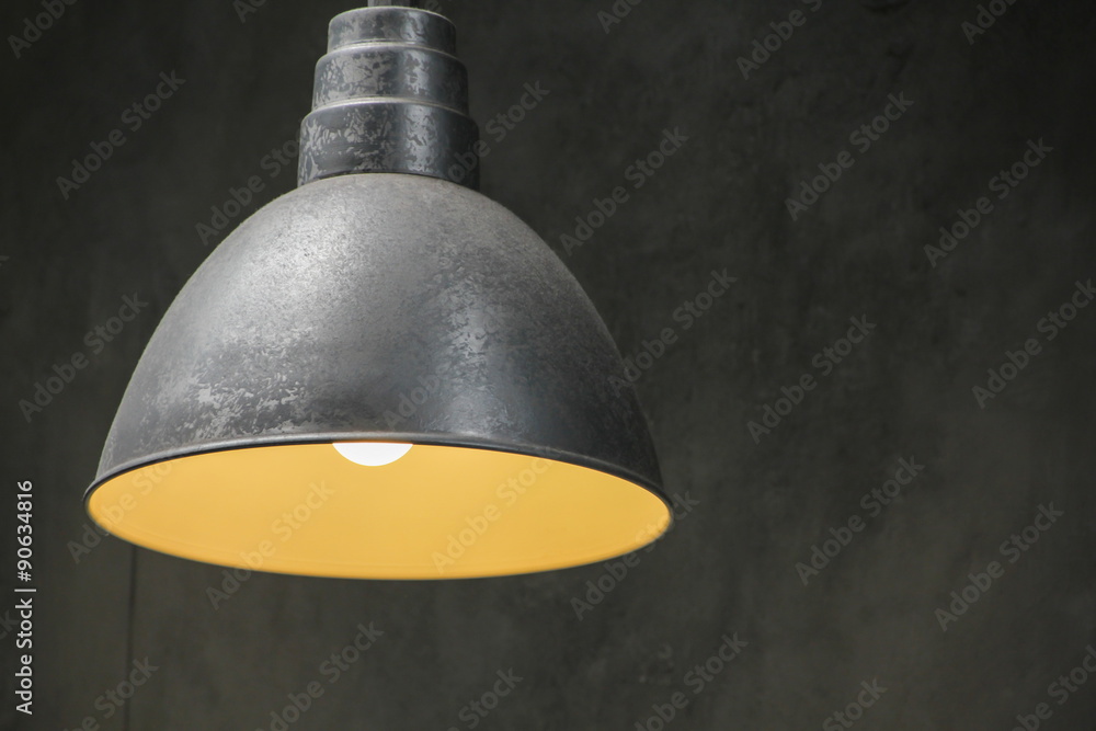 Lamp on concrete wall
