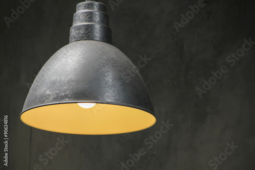 Obraz na płótnie Lamp on concrete wall w salonie