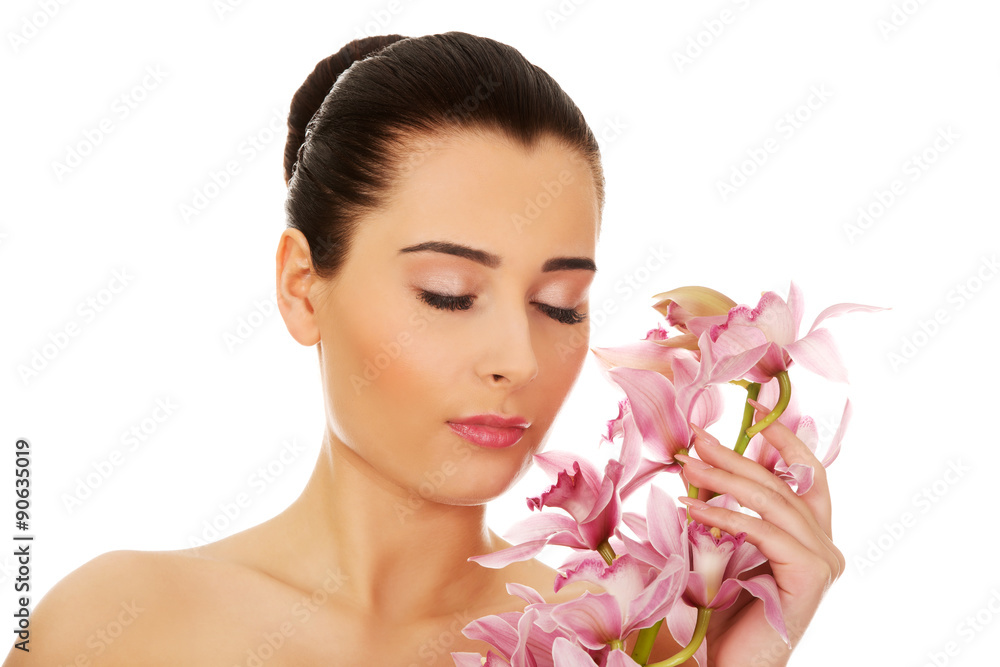 Beautiful woman with pink flower.