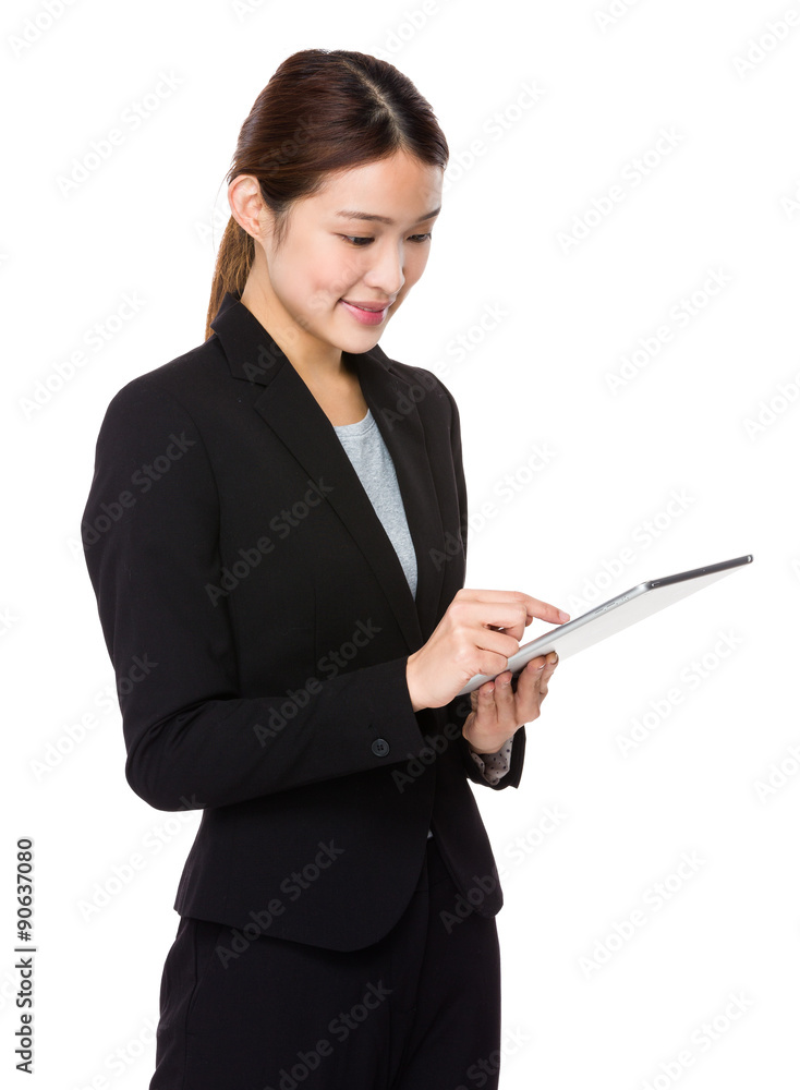 Businesswoman use of the tablet pc Businesswoman use of the tablet pc