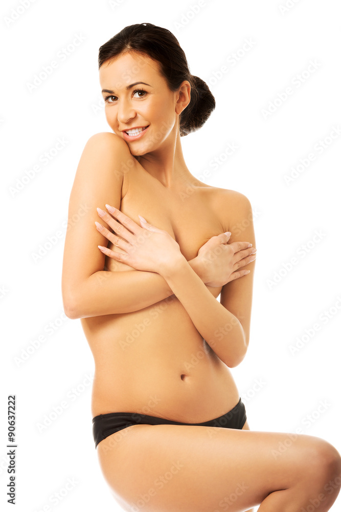 Obraz premium Laughing woman covering her breast