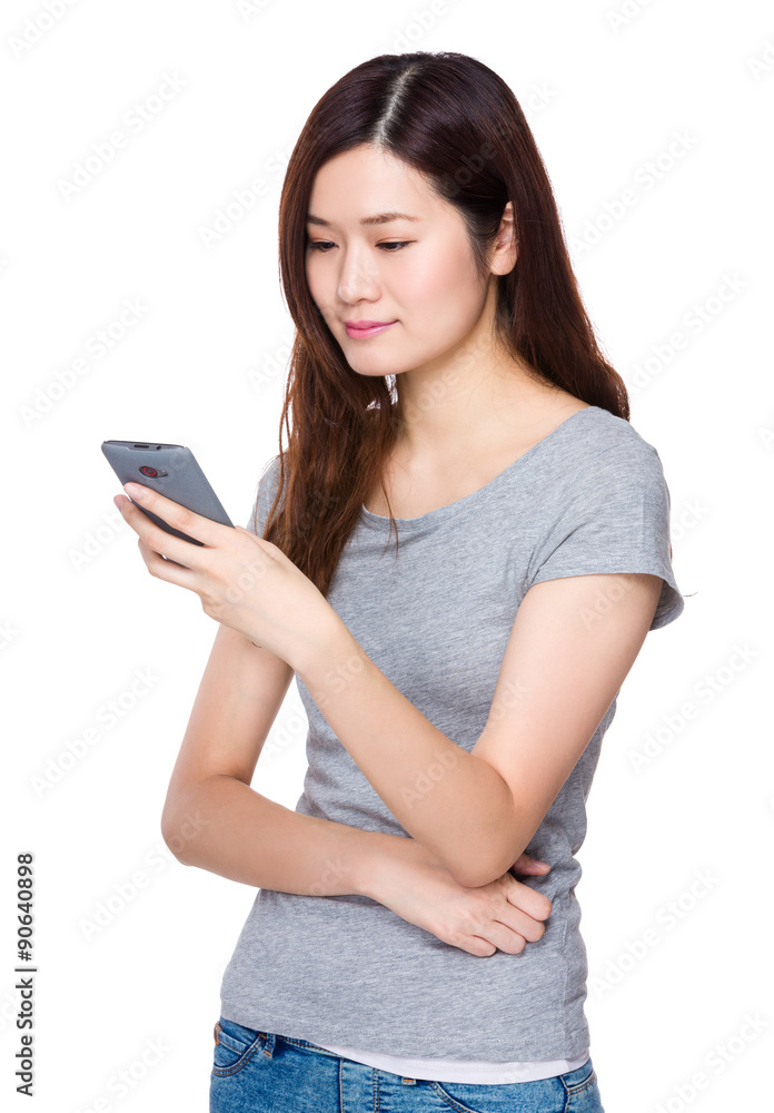 Asian young woman use of the cellphone Asian young woman use of the cellphone