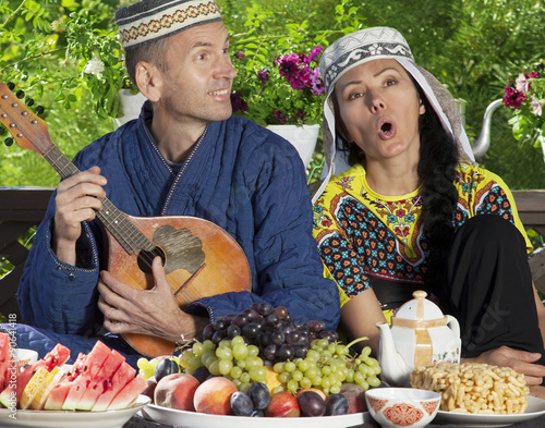 Uzbekistan couple playing mandolin photo