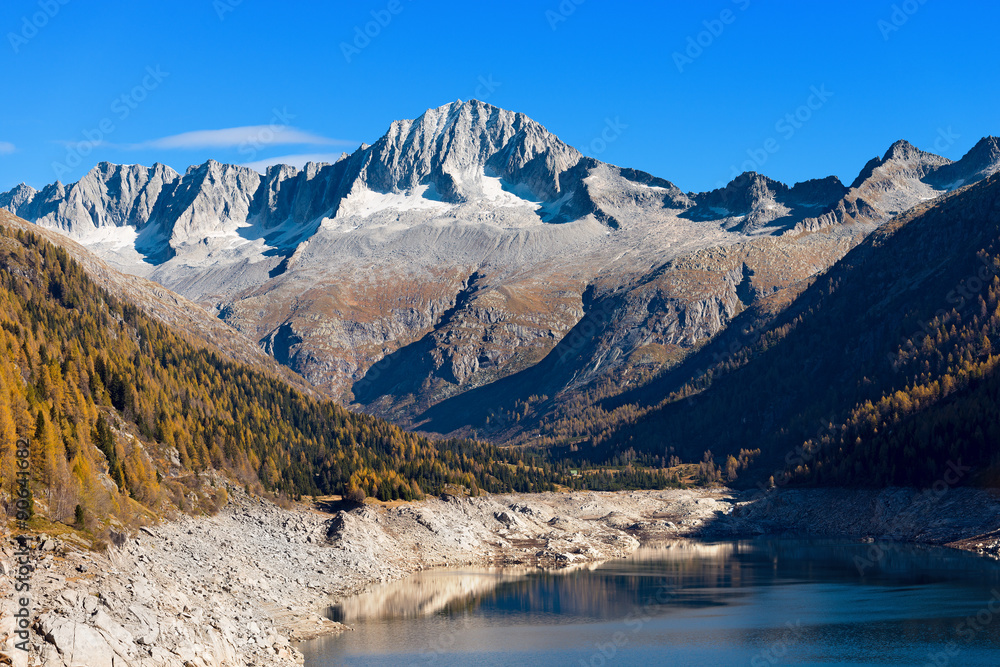 Care Alto and Bissina Lake - Trentino Italy / Peak of Care Alto (3462 m) and Lake of Malga Bissina in the National Park of Adamello Brenta. Trentino Alto Adige, Italy