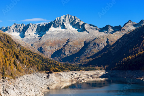 Care Alto and Bissina Lake - Trentino Italy / Peak of Care Alto (3462 m) and Lake of Malga Bissina in the National Park of Adamello Brenta. Trentino Alto Adige, Italy