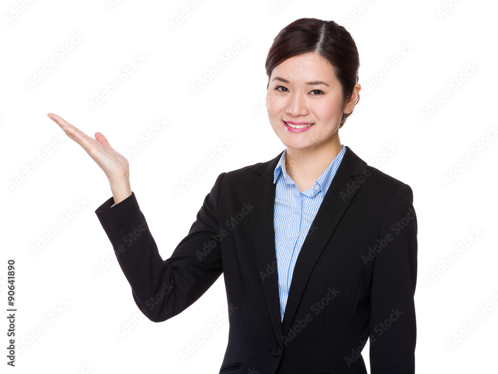 Asian young businesswoman with open hand palm Asian young businesswoman with open hand palm