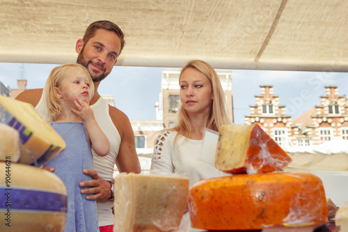 Photography Family buying cheese at the outdoor market