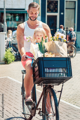 Photography Father cycling with his toddler daughter