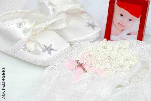 Baby girl photo, shoes, cross and hat for christening