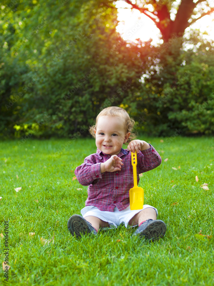 Little boy playing with a paddle. Little boy playing with a paddle.
