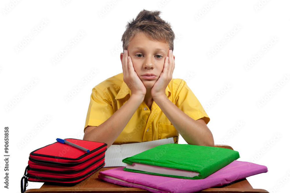 Boy with books looking bored. All on white background. Boy with books looking bored. All on white background.
