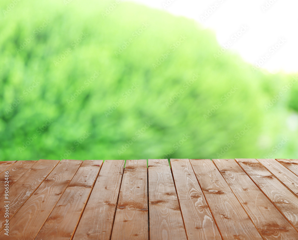 Wooden table with abstract blur background Wooden table with abstract blur background