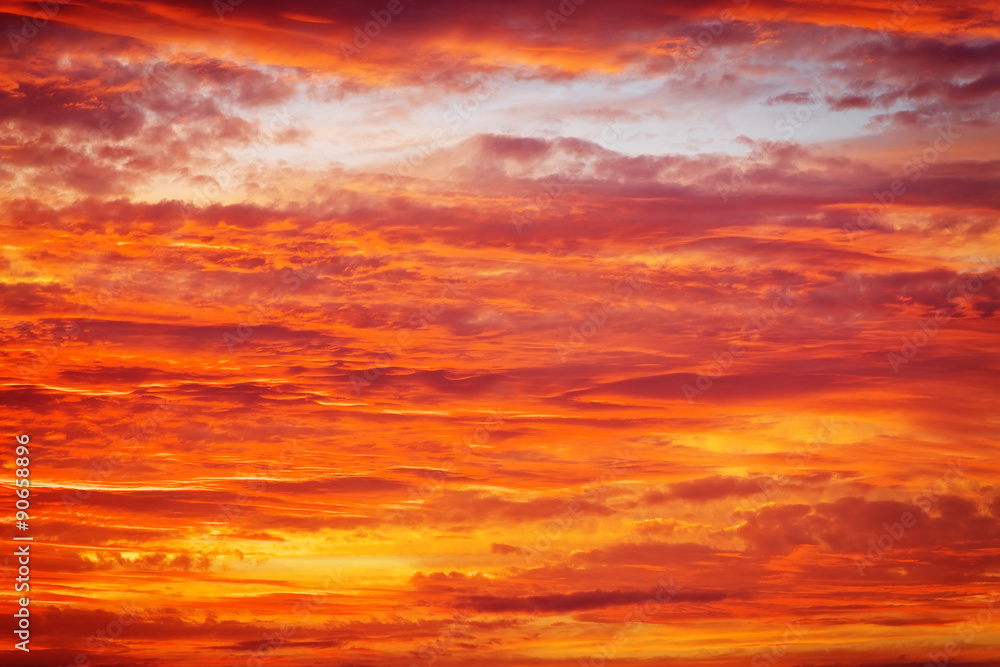Fiery orange sunset sky. Light after the sunset