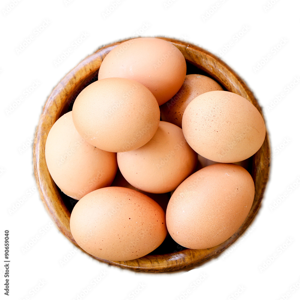 Eggs in wooden plate isolated on white background Eggs in wooden plate isolated on white background