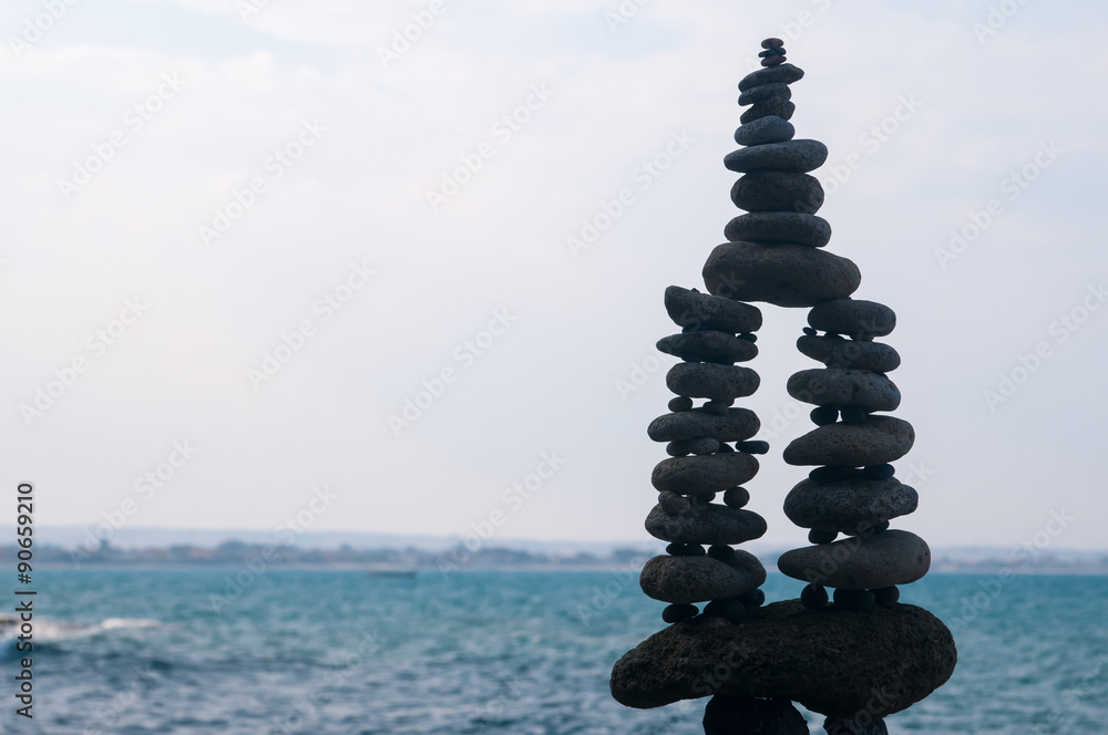 Fototapeta premium Stone pile in a beach