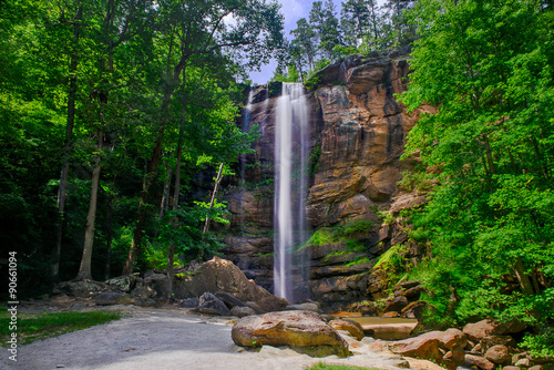 Beautiful high waterfall in the summertime long exposure photo