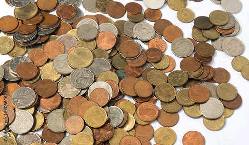 Many of Pile of coins baht Thailand currency on white background.