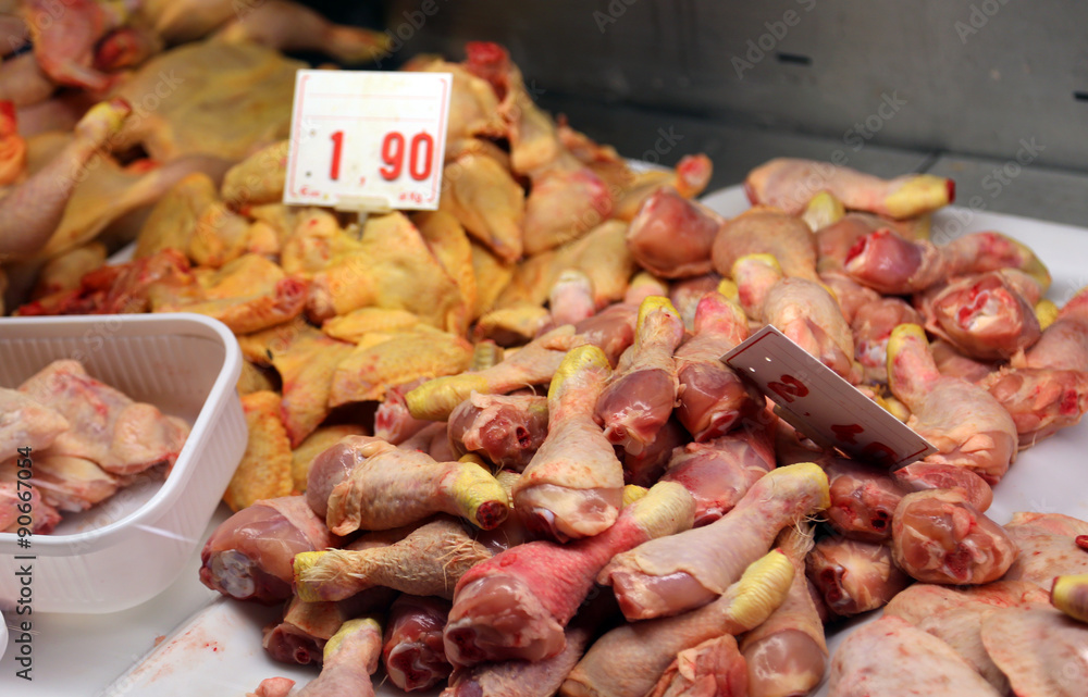 raw chicken thighs for sale in the butcher shop raw chicken thighs for sale in the butcher shop