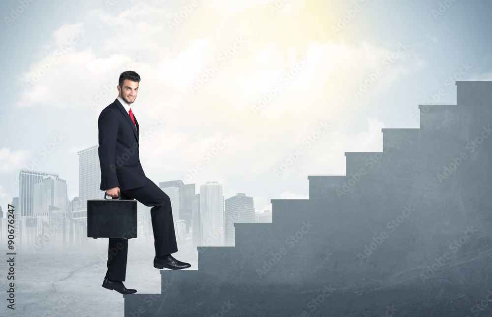 Businessman climbing up a concrete staircase concept Businessman climbing up a concrete staircase concept
