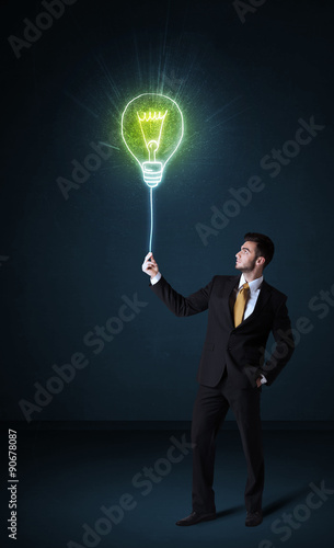 Businessman with an idea bulb